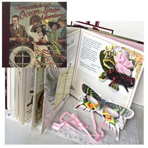 May include: An open scrapbook with decorative elements. The cover of the book is visible, titled "Samantha's Ocean Liner Adventure." Inside, pages feature text, a peacock feather, paper flowers, and a butterfly cutout. Pink ribbon and lace trim the pages.