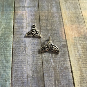 Silver whale tail Charm