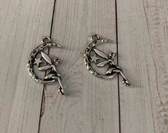 Silver fairy on moon Charm