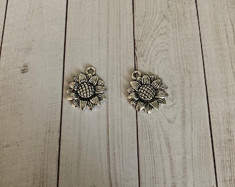 Silver sunflower charm