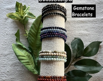 BRACCIALE CON PIETRE PREZIOSE Bracciale elastico con perline e pietre preziose