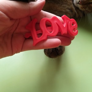 Soviet-era hair clip with the inscription Love