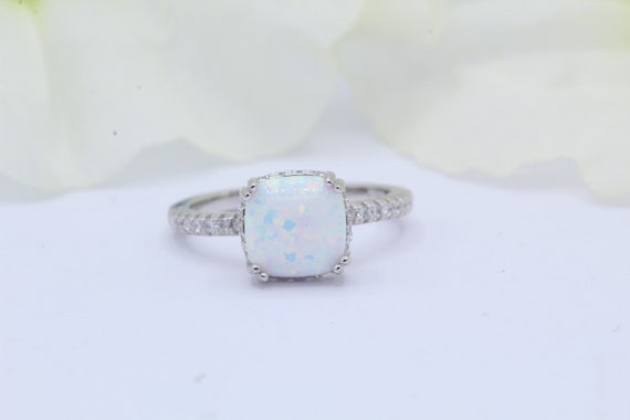 Sterling Silver Blue Cushion Square Created Opal and CZ Halo Ring Sterling Silver Blue Cushion Square Created Opal and CZ Halo Ring