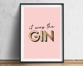 Peut inclure: Un fond rose avec du texte noir qui dit "it was the GIN" en lettres dorées.