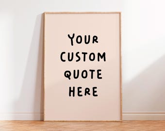 May include: A framed print with a light pink background and black text that reads "YOUR CUSTOM QUOTE HERE".