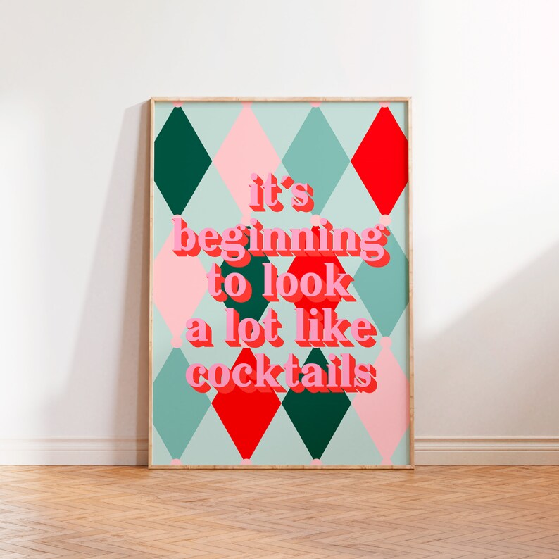 May include: A colorful poster with a diamond pattern in shades of pink, green, and red. The text "it's beginning to look a lot like cocktails" is written in pink letters.