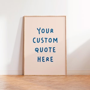 Peut inclure: Une affiche encadrée avec un fond rose clair et du texte bleu qui dit "YOUR CUSTOM QUOTE HERE".