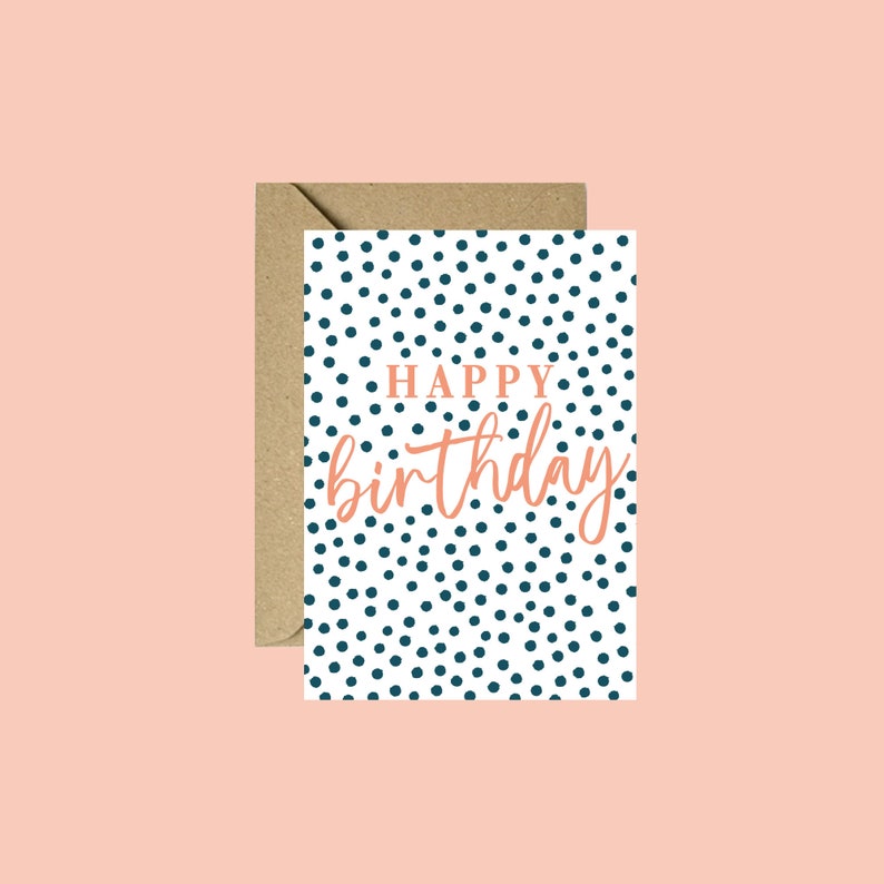 May include: A white card with a blue polka dot pattern and the text "HAPPY birthday" in orange.