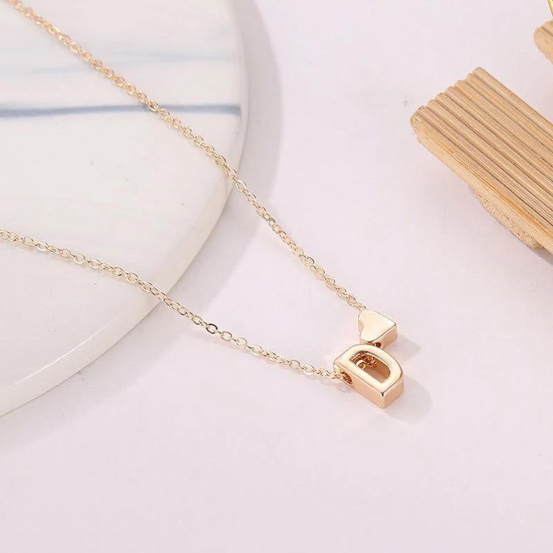 collier avec la lettre o