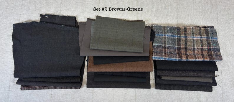 May include: A collection of fabric swatches in various shades of brown and green. The swatches include solid colors, plaids, and textured materials. The text "Set #2 Browns-Greens" is visible at the top of the image.