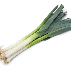 May include: A bunch of fresh green leeks with white stalks and green leaves.
