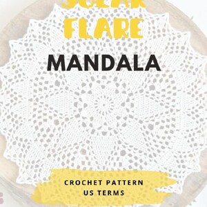 May include: A white crocheted doily with a circular, intricate, star-like pattern. The text reads SOLAR FLARE MANDALA, CROCHET PATTERN US TERMS, and KIM(H)AAKT. The design features a central point with radiating geometric stitches.