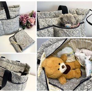 May include: A quilted tote bag featuring a black and white paisley pattern with black handles and exterior pockets. The interior is lined with a yellow and white grid fabric. Included is a matching folded mat and a grey plush teddy bear.