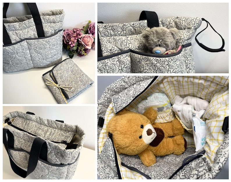 May include: A quilted tote bag featuring a black and white paisley pattern with black handles and exterior pockets. The interior is lined with a yellow and white grid fabric. Included is a matching folded mat and a grey plush teddy bear.