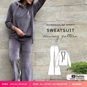 May include: A grey velour sweatsuit consisting of a long-sleeved hooded top with drawstrings and matching wide-leg pants. The image includes a technical line drawing of the garment and text reading GLAMOROUS YET SPORTY SWEATSUIT sewing pattern.