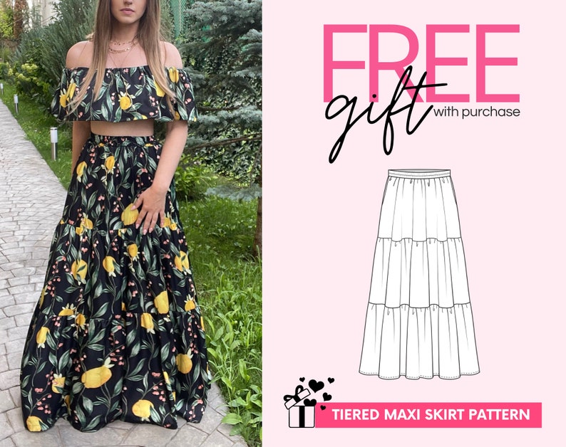 May include: A two-piece outfit consisting of an off-the-shoulder crop top and a floor-length tiered maxi skirt, both featuring a black fabric with a yellow lemon and green leaf print. A technical line drawing of the skirt is also displayed.