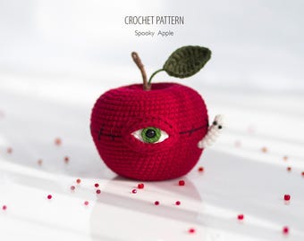 Patrón de ganchillo de manzana con ojo fantasmal, amigurumi de Halloween con gusano extraíble. Manzana monstruosa. (INGLÉS)