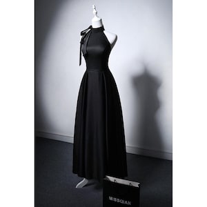 minimalist chic black halter dress Style inspo from your faves Featuring: Cresida Keyhole Racerback Maxi Dress Black #selfieleslie