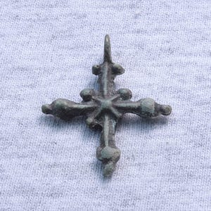 Ancient bronze cross of the Viking Age (medieval). Talisman. . 9-11th century AD. Authentic archaeological find.