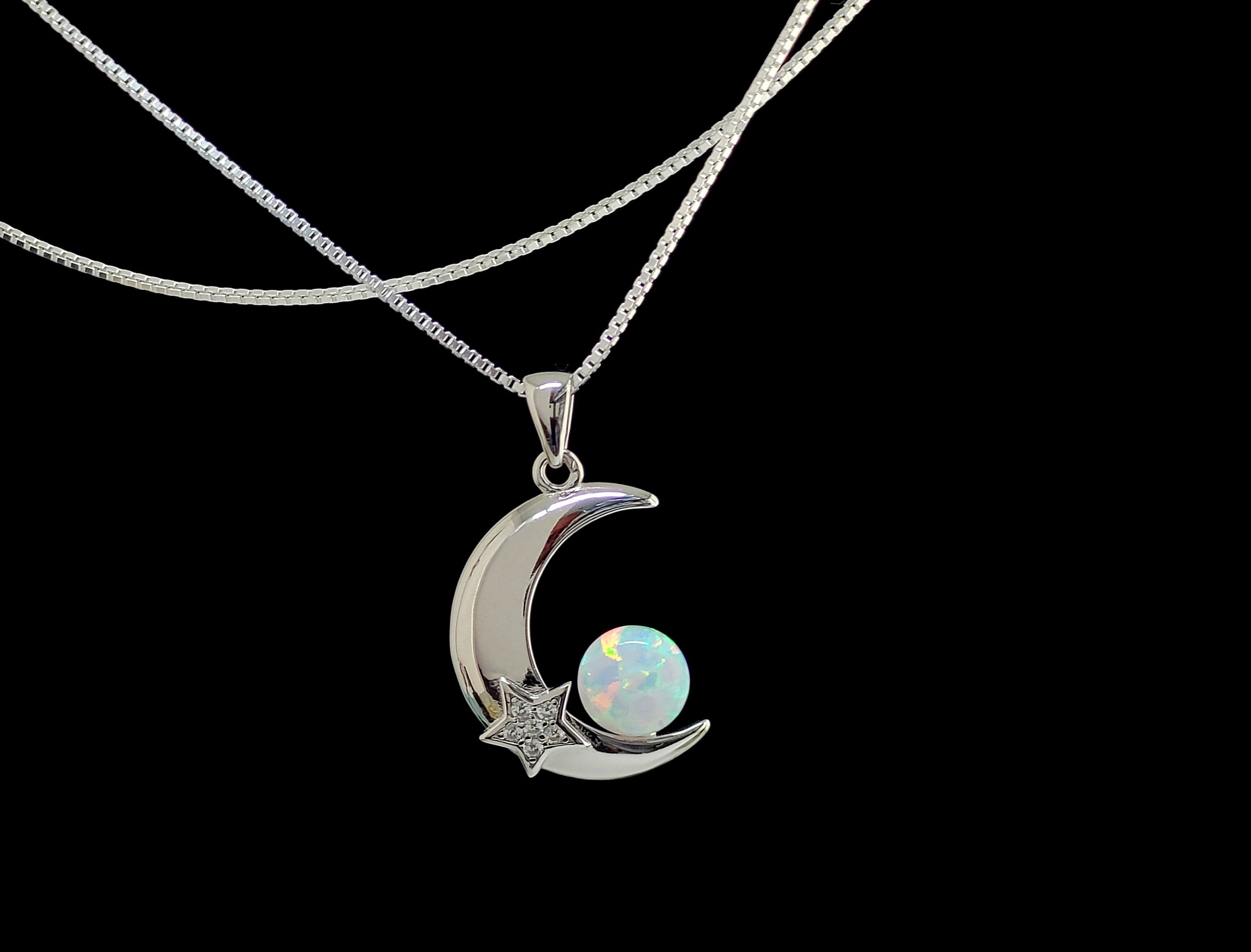 White Opal Half Moon Necklace. With White Sapphire star .925 Sterling Silver.