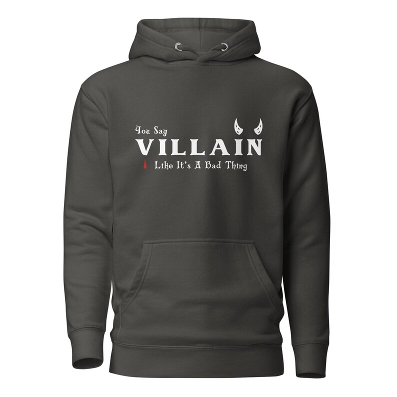 A grey You Say Villain Like Its A Bad Thing hoodie with cute devil horns created by graphic apparel company Midnight Gypsy Designs as part of their Dark Academia clothing and Bookish Merch clothing line.