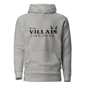An athletic grey You Say Villain Like Its A Bad Thing hoodie with cute devil horns created by graphic apparel company Midnight Gypsy Designs as part of their Dark Academia clothing and Bookish Merch clothing line.