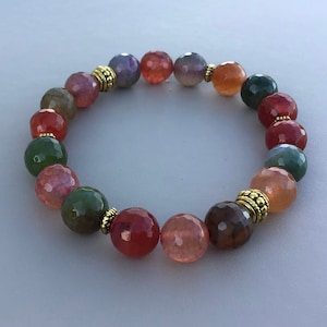 Fire Agate Bracelet. Multicoloured. Made in Ireland. Faceted beads. Vibrant colours. Stretch bracelet.