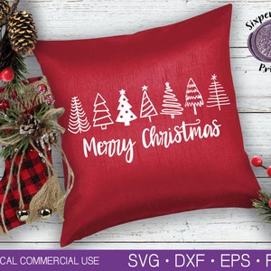 May include: Red cushion with white stylised Christmas trees and the text "Merry Christmas".