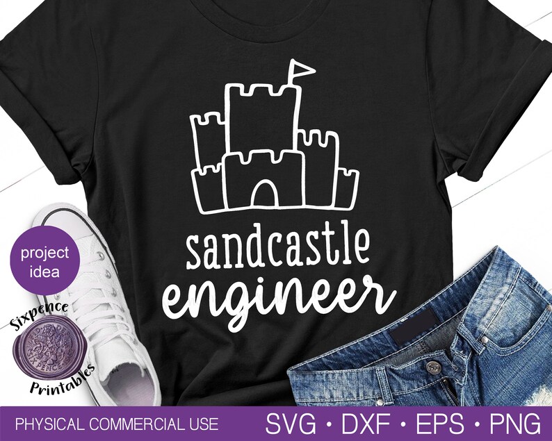 May include: Black t-shirt with a white sandcastle graphic and the text "sandcastle engineer".