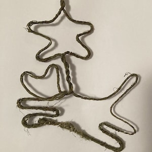 May include: A brown, rustic, twine Christmas tree ornament with a star on top.