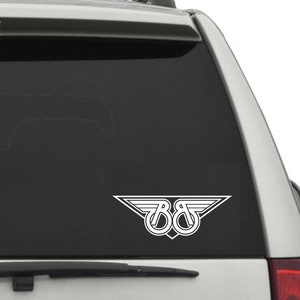 May include: A white vinyl decal of the band logo for the rock band "B.O.B."