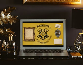 May include: A laptop computer with a yellow background displaying the Hogwarts crest and the words "Hogwarts, Draco Dormiens Nunquam Titillandus". The laptop is on a dark surface with a gold picture frame, a gold lamp, and a gold and black decorative stand.