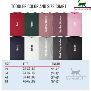 May include: Toddler size chart for t-shirts with colour options. Sizes 2T, 3T, 4T, and 5T with corresponding weight ranges and length measurements in inches. Colours include red, forest, heather mauve, heather maroon, pink, navy, white, athletic heather, dark grey heather, and black.