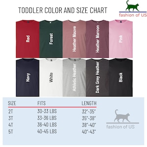 May include: Toddler size chart for t-shirts with color options including red, forest, heather mauve, heather maroon, pink, navy, white, athletic heather, dark grey heather, and black. The chart shows sizes 2T, 3T, 4T, and 5T with corresponding weight ranges and length measurements in inches.