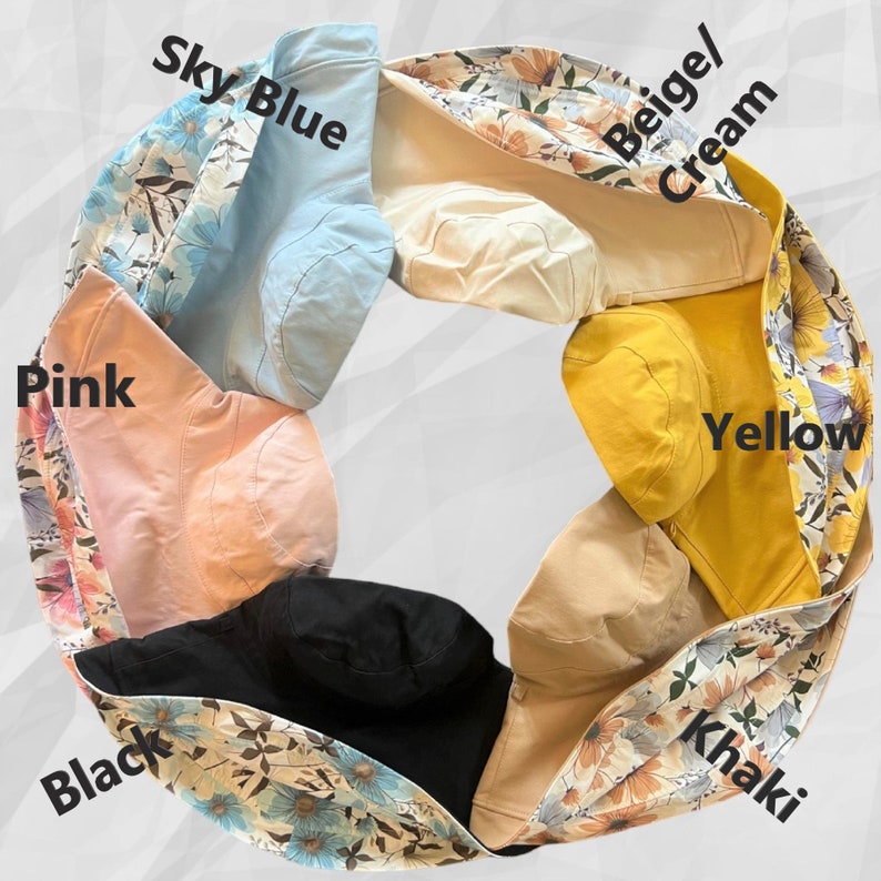 May include: A set of 8 reversible bucket hats in various colors, including pink, black, sky blue, beige, yellow, and khaki. Each hat has a floral print on one side and a solid color on the other.