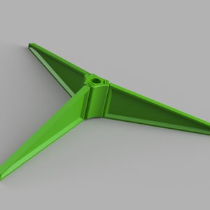 May include: A green plastic tripod stand with a round hole in the center.