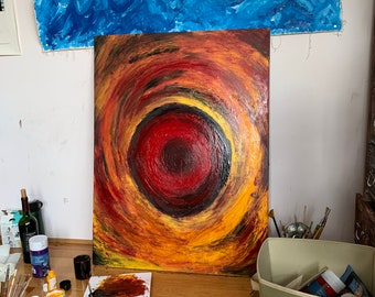 orange and red spiral painting