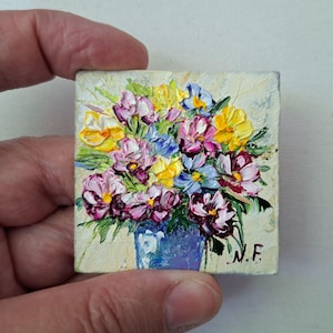 Oil painting of flowers in the impasto technique: a tiny floral still life for a dollhouse