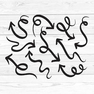 May include: A set of 16 black hand-drawn arrows with different styles and directions. The arrows are on a white woodgrain background.