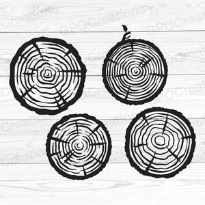 May include: Four black and white illustrations of tree rings, each with a different pattern and size. The tree rings are on a white wood background.