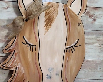 Cabide para porta de cavalo