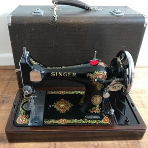 Painting an old mock croc case for a Singer Sewing Machine 