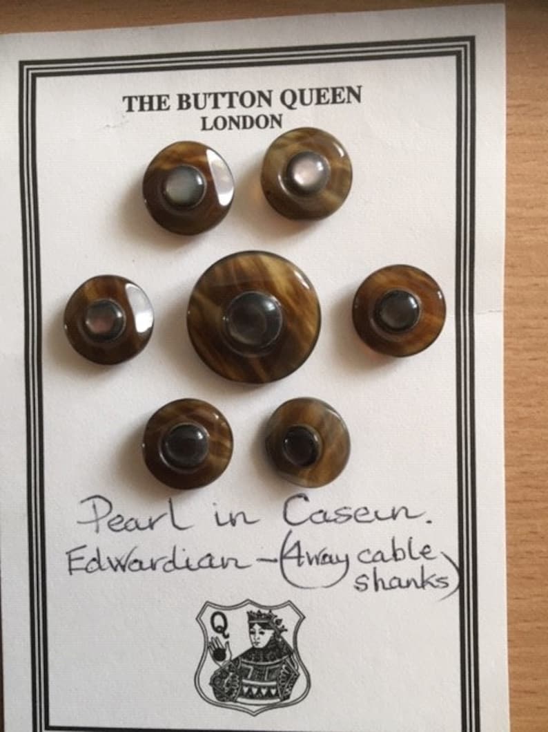 Set of 7 Edwardian Pearl in Casein Buttons from The Button Queen in London
