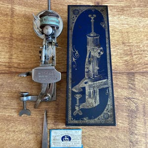 Rare Antique Victorian Moldacot Pocket Sewing Machine with Original Blue Tin, Bobbin Winder and Needle c1886-1888