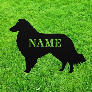 May include: Black silhouette of a Collie dog with the word "NAME" written on the body. The silhouette is on a green grassy lawn.
