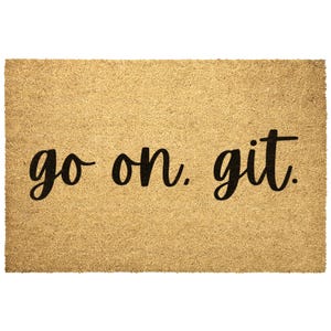 May include: A rectangular doormat with the words "go on. git." in black script. The mat is made of a natural tan coir material, perfect for an entryway.