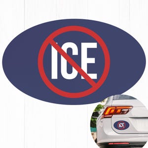 May include: An oval-shaped sticker with a navy blue background and the words "ICE" in white, crossed out by a red circle. The sticker is shown on a white car, suggesting it's a bumper sticker or window decal.