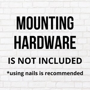 Puede incluir: Pared de ladrillo blanco con texto negro que dice "MOUNTING HARDWARE IS NOT INCLUDED *using nails is recommended"