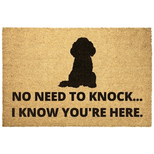 May include: A brown coir doormat with the text "NO NEED TO KNOCK... I KNOW YOU'RE HERE." and a black silhouette of a dog sitting.