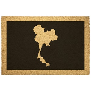 May include: A brown doormat with a tan outline and a tan outline of the country of Thailand in the center.